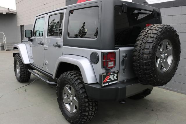 Pre-Owned 2013 Jeep Wrangler Unlimited Freedom Edition Sport/Utility in ...