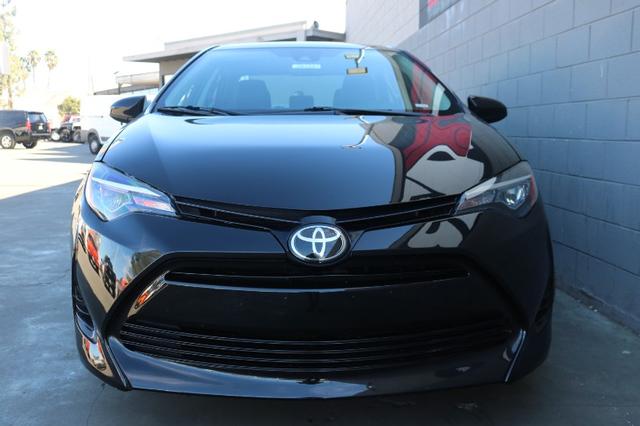 Pre-Owned 2019 Toyota Corolla LE Four-Door Sedan in Orange #26124